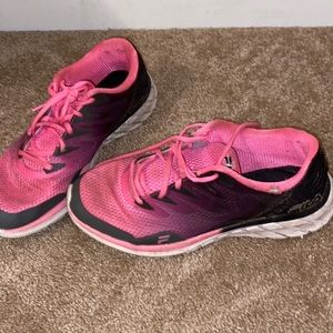 Nice pink tennis shoes! Has some wear and tear!